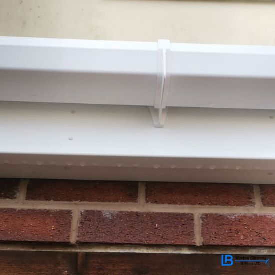 white upvc gutter after being cleaned